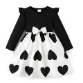 Sukienka dziewczęca czarno-biała z kokardą i motywem serc