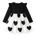 Sukienka dziewczęca czarno-biała z kokardą i motywem serc