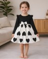 Sukienka dziewczęca czarno-biała z kokardą i motywem serc